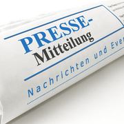 Zeitung mit Beschriftung Pressemitteilung